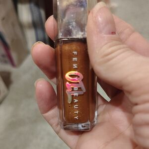 Fenty Beauty Gloss Bomb in Coppa Cookie.